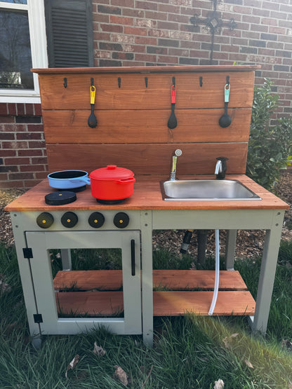 Add Hose connection and manual pump on one sink