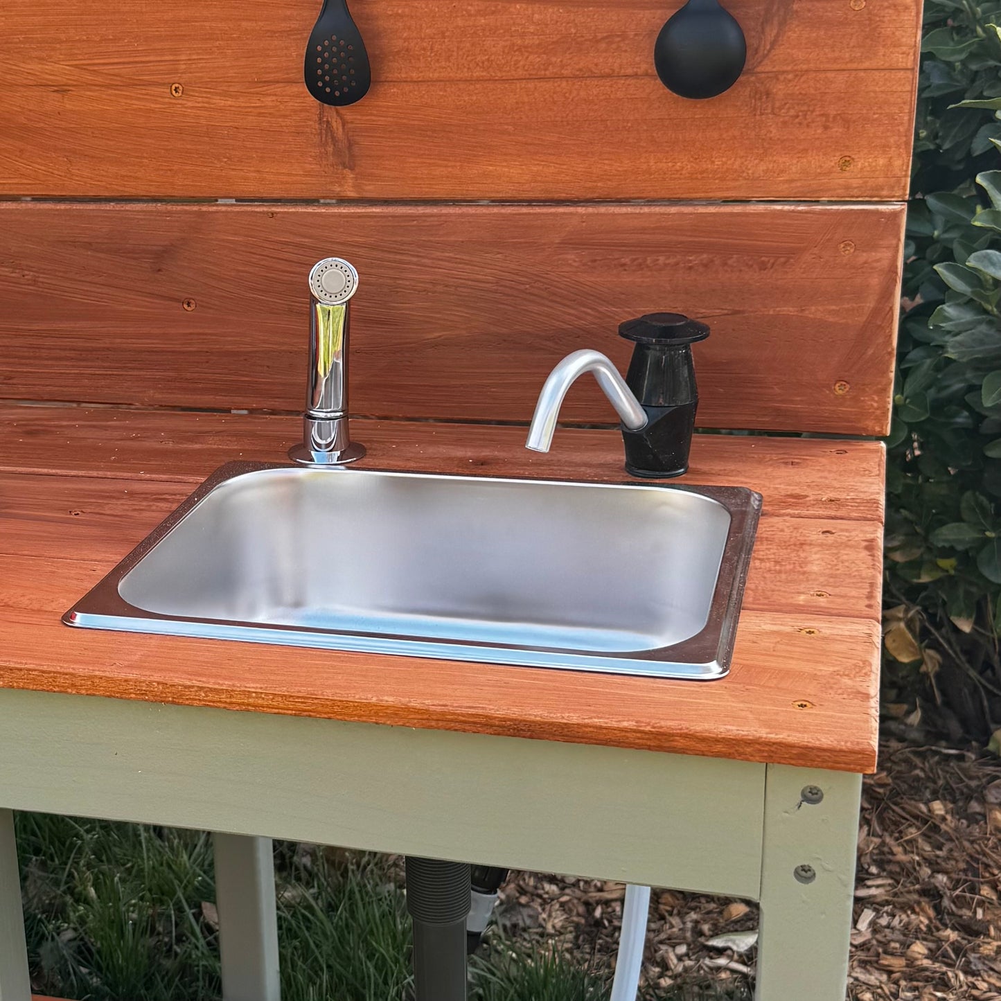 Add Hose connection and manual pump on one sink